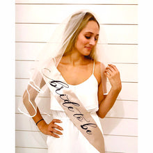 Load image into Gallery viewer, Bride to Be 4" Glitter Satin Sash. Satin sash with Rose Gold, Black, Gold or Silver Glitter writing! Bridal Shower Sash! Bachelorette Sash!
