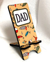Load image into Gallery viewer, Fishing lures Cell Phone Stand. Fish Cell Phone Stand, Fishing iPhone dock. Fisherman Gift. Great gift for dad!  Fishing party favors!