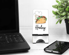 Load image into Gallery viewer, Taco 'bout a Phone Stand. Cell Phone Stand, Taco lover Gift. Custom Taco gift! Teacher, co worker gift! Custom Taco themed gift!