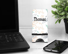 Load image into Gallery viewer, Dinosaur Cell Phone Stand. Custom Phone Stand, Dino phone stand, Gift for teacher, iphone holder, cell phone holder, charging stand