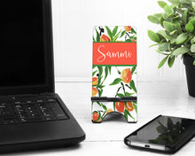 Load image into Gallery viewer, Peach Cell Phone Stand. Personalized Georgia Cell Phone Stand, Fits most Cell phones, I phone dock! Peach Themed gift! Custom Georgia Gift!
