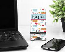 Load image into Gallery viewer, Nurse Cell Phone Stand. Great nurse gift! Nurse Personalized gift, Nursing Student Graduation gift! Custom Nurse Gift. Nurse appreciation
